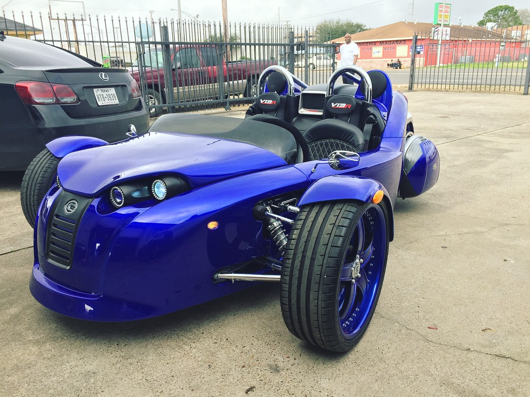 Blue custom three-wheeled vehicle from the supplied photo collection